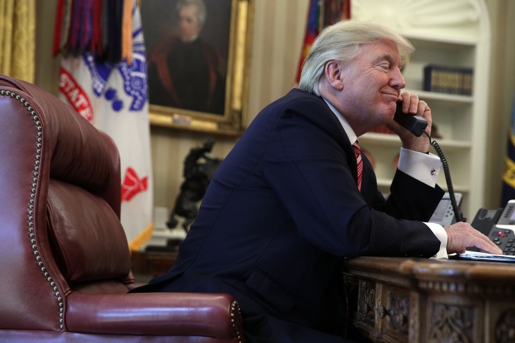 WASHINGTON, DC - JUNE 27: U.S. President Donald Trump speaks on the phone with Irish Prime Minister Leo Varadkar on the phone in the Oval Office of the White House June 27, 2017 in Washington, DC. President Trump congratulated Prime Minister Varadkar to become the new leader of Ireland. (Photo by Alex Wong/Getty Images)