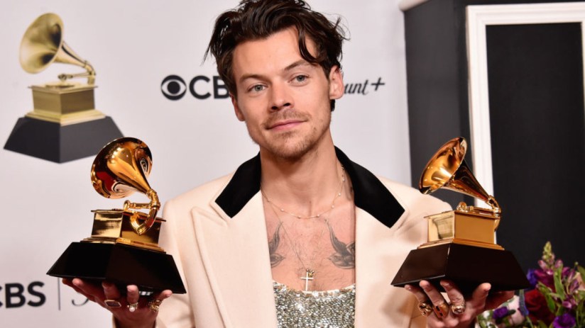 Harry Styles poses with the Best Pop Vocal Album Award and Album of the Year Award for Harry&rsquo;s House during the 65th Grammy Awards in February 2023. (Photo by Alberto E. Rodriguez/Getty Images for The Recording Academy)