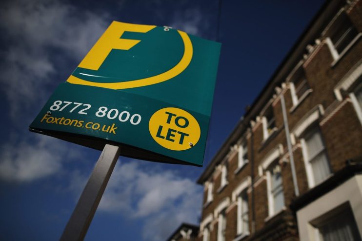 LONDON, ENGLAND - JANUARY 30: A general view of a To Let sign next to property near Clapham on January 30, 2013 in London, England.