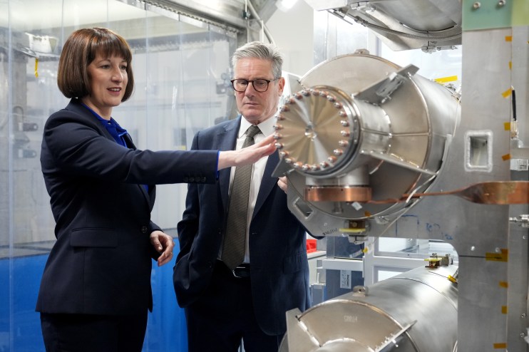DARESBURY, ENGLAND - SEPTEMBER 22: Chancellor of the Exchequer, Rachel Reeves (L), and UK Prime Minister, Keir Starmer (R), during a visit to PsiQuantum on September 22, 2024 in Daresbury, England. PsiQuantum, the world&rsquo;s largest quantum company, is based in the Liverpool City Region at Daresbury. Backed by &pound;9 million of UK government funding, it is PsiQuantum&rsquo;s first research and development facility anywhere outside the US. Their aim is to build the world&rsquo;s first large scale quantum computer, capable of solving complex problems. (Photo by Christopher Furlong/Getty Images)