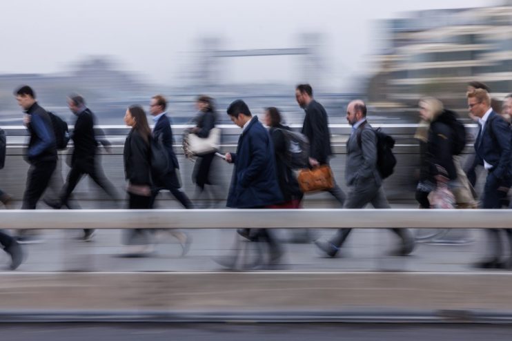 New employment rights concept with diverse workers discussing whistleblowing and sick pay regulations in an office setting
