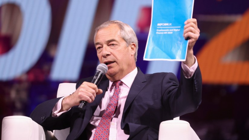 Reform UK leader Nigel Farage displays Reform's new Cryptoassets and Digital Finance Bill at Bitcoin Conference in Las Vegas, 2025.