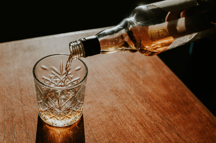 Profit at the maker of Glengoyne whisky has been slashed.
