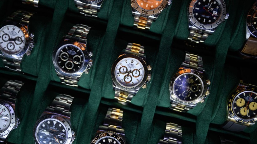 US President Donald Trump's tariffs have impacted the Swiss watch market. (Photo by Leon Neal/Getty Images)