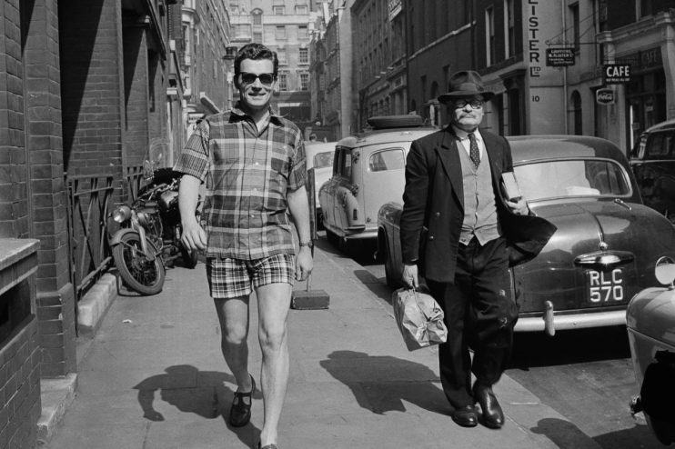 A man struts in shorts