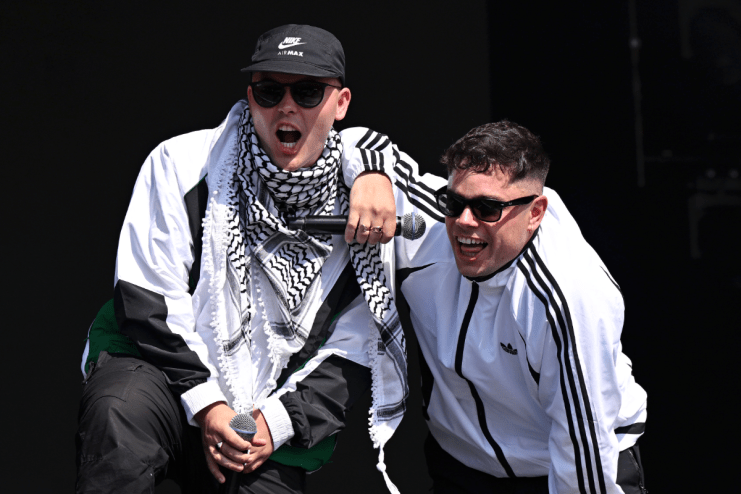 Mo Chara and M&oacute;gla&iacute; Bap of Kneecap performing at Glastonbury 2025