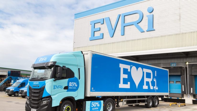 Liveried Evri vehicles by a distribution centre. Credit: Evri/PA