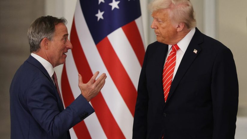 Trump has warned the Washington Commanders, owned by Josh Harris (left), that he may block their stadium move
