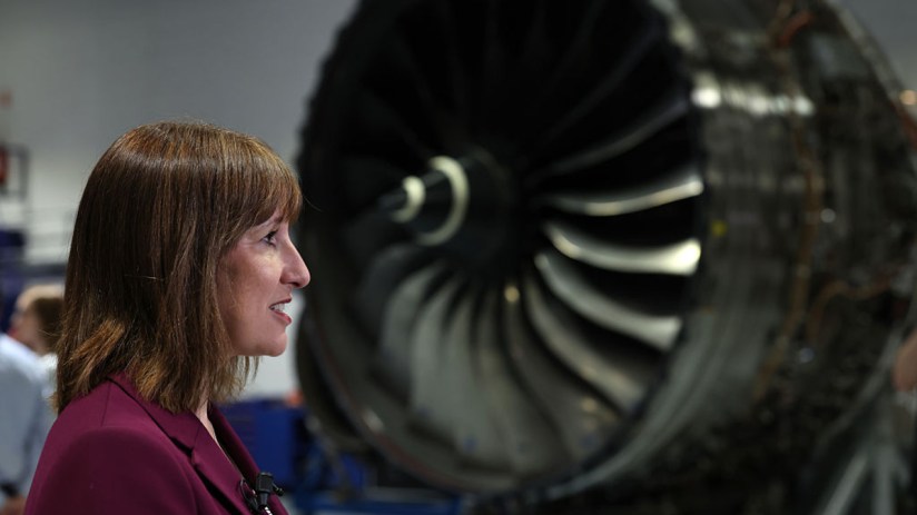 Chancellor of the Exchequer Rachel Reeves speaks to members of the media at the Rolls-Royce factory in May 2025 in Derby. (Photo by Darren Staples - WPA Pool/Getty Images)