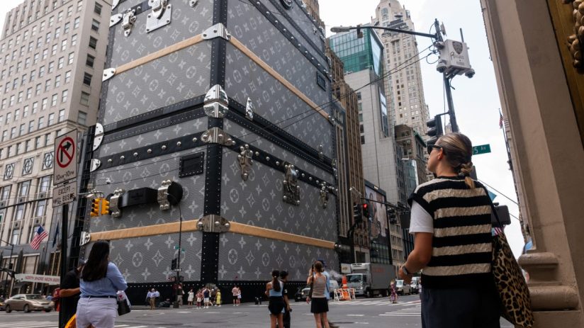 NEW YORK, NEW YORK - JULY 14: The 19-story fa&ccedil;ade of the Louis Vuitton luxury store, which is closed for renovations, stands wrapped in a design reminiscent of their monogrammed trunks in Manhattan on July 14, 2025, in New York City. Weeks after Democratic socialist candidate Zohran Mamdani won the Democratic primary for mayor of New York City, various wealthy interest groups have begun to mobilize against the 33-year-old state assemblyman. Mamdani has vowed to freeze rent hikes for a year, make buses free, and increase taxes on wealthy New Yorkers. Former Gov. Andrew Cuomo announced that he will continue his run as a third-party candidate for New York City mayor after losing to Zohran Mamdani in last month's Democratic primary. (Photo by Spencer Platt/Getty Images)