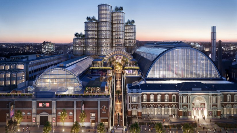 Olympia at dusk showcasing its historic architecture, illuminated for upcoming events and its 140th anniversary celebration