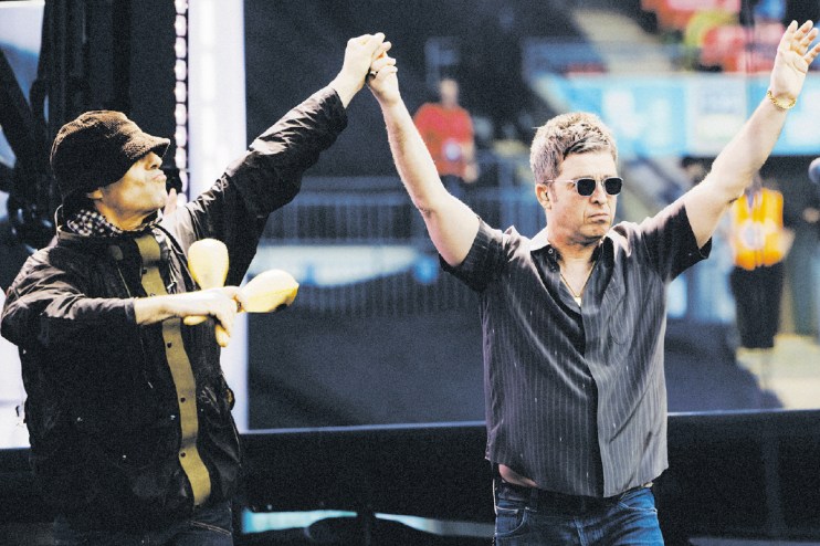Oasis fans protesting against ticket resale outside UK concert venue amid government crackdown on ticket touting