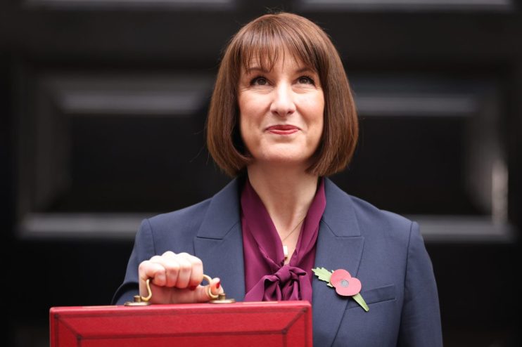 LONDON, ENGLAND - OCTOBER 30: Chancellor Rachel Reeves poses with the red box outside number 11 Downing Street on October 30, 2024 in London, England. This is the first Budget presented by the new Labour government and Chancellor of the Exchequer, Rachel Reeves. (Photo by Dan Kitwood/Getty Images)