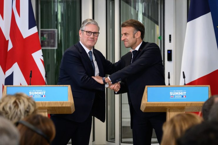 LONDON, ENGLAND - JULY 10: UK Prime Minister Keir Starmer (L) and French President Emmanuel Macron shake hands during the press conference at the conclusion of a joint military visit to the Northwood Headquarters Northwood, on July 10, 2025 in London, England. President Emmanuel Macron and Mrs Brigitte Macron visit the UK in the first visit State Visit made by France in 17 years. They are staying at Windsor Castle, hosted by King Charles III and Queen Camilla, and a banquet will be held there in their honour. The Macrons will visit Imperial College, and the President will address Parliament during his stay. (Photo by Leon Neal/Getty Images)