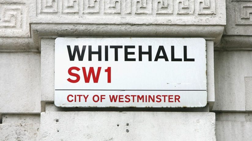 LONDON-SEPTEMBER 17: LONDON-SEPTEMBER 17: The street sign for Whitehall sits on a building across from Britain's Houses of Parliament on September 17, 2004 in London, England. (Photo by Scott Barbour/Getty Images)