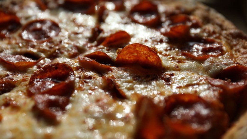 The boss of Papa John's in the UK has predicted the division will return to profit in 2025. (Photo illustration by Joe Raedle/Getty Images)