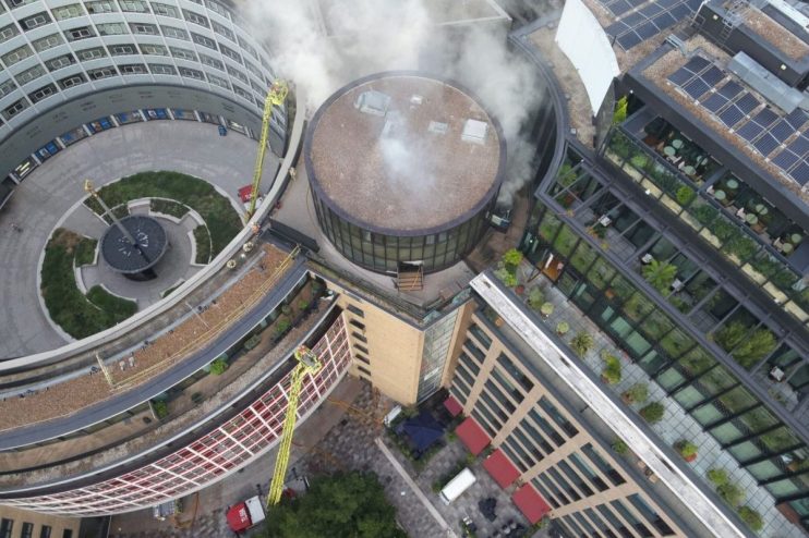 The fire is affecting floors towards the top of the building, which include a restaurant and an area of external decking and ducting, while an unknown number of flats have also potentially been affected. Photo credit: London Fire Brigade /PA Wire.