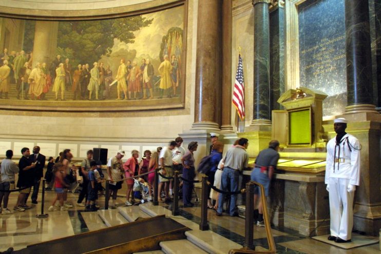 391461 03: Visitors wait in line to view the original copies of the Declaration of Independence, the Constitution and the Bill of Rights July 4, 2001 at the National Archives in Washington, D. C. (Photo by Alex Wong/Getty Images)