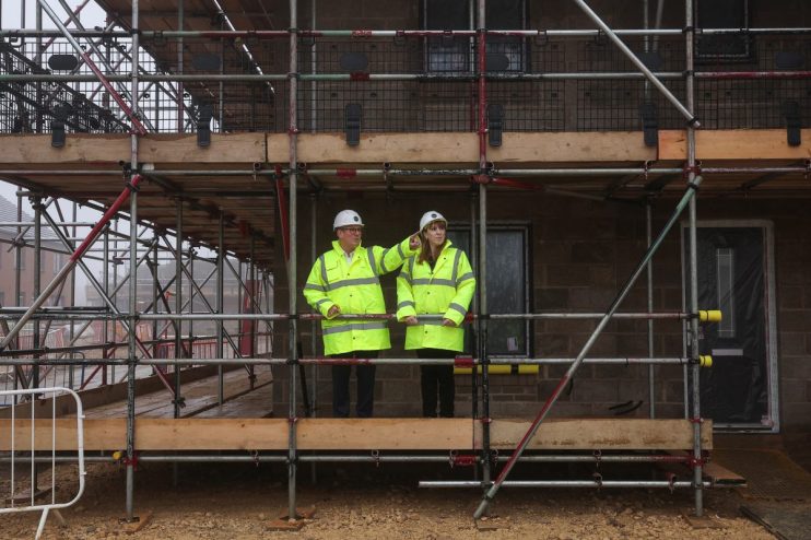 CAMBRIDGESHIRE, ENGLAND - DECEMBER 12: Prime Minister Keir Starmer and Deputy Prime Minister Angela Rayner make a visit to a construction site on December 12, 2024 in Cambridgeshire, England. The Labour government is announcing planning reforms to encourage economic growth and meet the government's goal of building 1.5 million new homes over the next five years. (Photo by Chris Radburn - Pool/Getty Images)