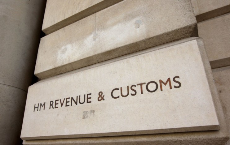 A general view of the sign for the government department of HMRCin Westminster. (Photo by Oli Scarff/Getty Images)