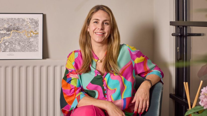 Alex Head, CEO and founder of Social Pantry, smiling confidently in a business suit.