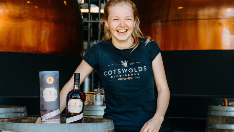 Alice Pearson showcasing Cotswolds Wychwood Harvest Single Malt Whisky at Cotswolds Distillery, limited edition release 2025.