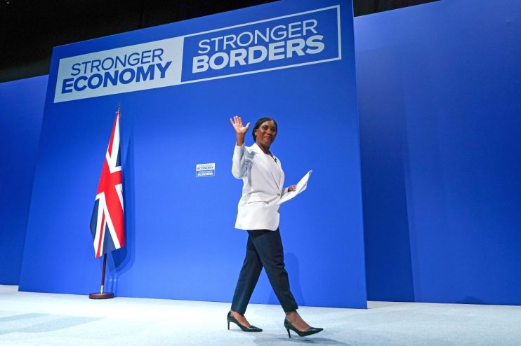MANCHESTER, ENGLAND - OCTOBER 05: Kemi Badenoch, Leader of the Conservative party, leaves the stage after addressing delegates in her &lsquo;Leaders Welcome&rsquo; speech on the first day of the Conservative party conference on October 05, 2025 in Manchester, England.Kemi Badenoch goes into her first conference as party leader with current polling putting the Conservative Party in fourth place behind Reform, Labour and the Liberal Democrats. (Photo by Ian Forsyth/Getty Images)