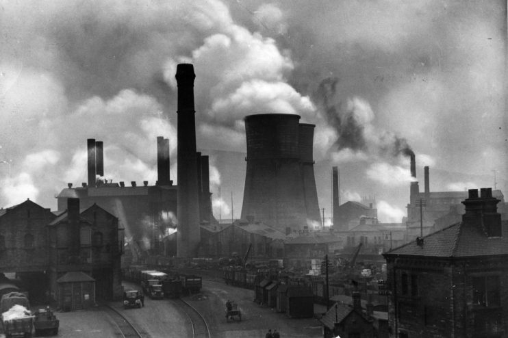circa 1940: Blast furnaces at a steel mill at Halifax in Yorkshire. (Photo by Val Doone/Getty Images)