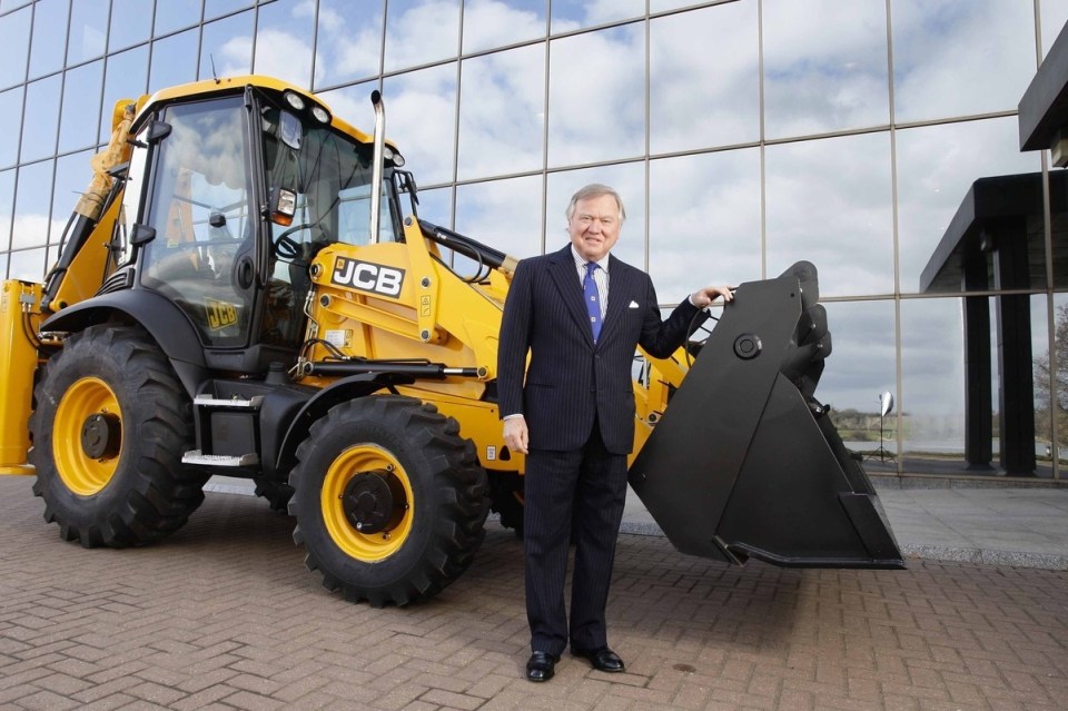Lord Bamford, prominent British business leader, in a formal setting, emphasizing his influential role in the industry.