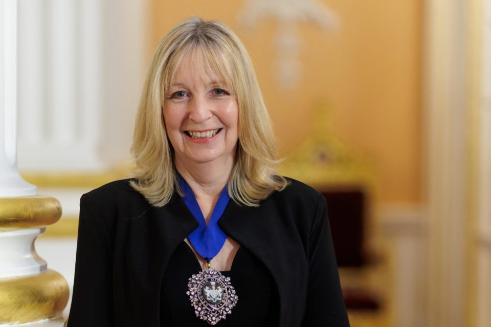 Lady Mayor Langley in official portrait, wearing formal attire, representing leadership in a professional setting