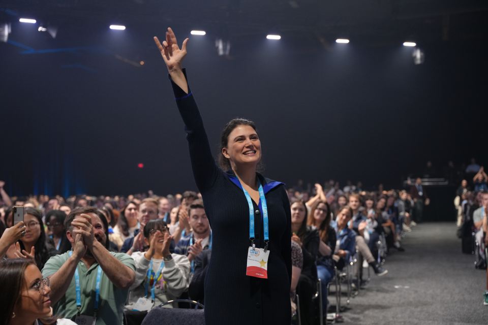 Della Robertson McKay speaking at One Young World Summit 2023, highlighting youth leadership initiatives
