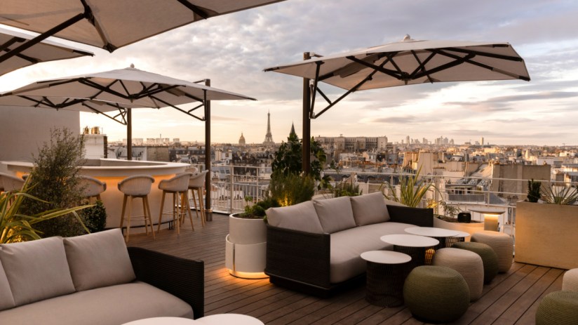 Hotel Dame Des Arts exterior with elegant architecture, vibrant Parisian street, credit Ludovic Balay