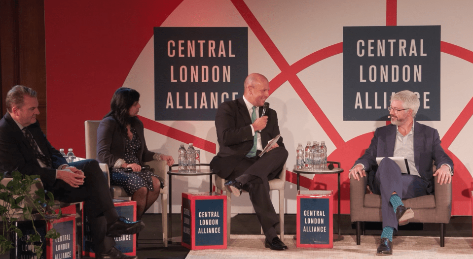 Panel discussion on Entrepreneurship, wealth and tax at a business conference, featuring industry experts.