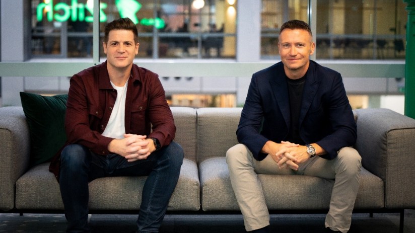 PhilandSean ZilchCo founders discussing business strategy in an office setting, highlighting innovative leadership and tea...