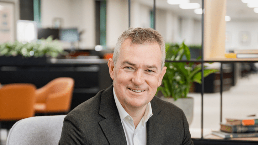 Simon Emeny, CEO of Fullers, delivers a keynote speech at a business conference, emphasizing leadership and industry insig...
