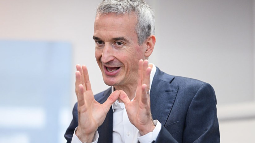 Eurotunnel CEO Yann Leriche discussing future expansion plans in a business meeting setting
