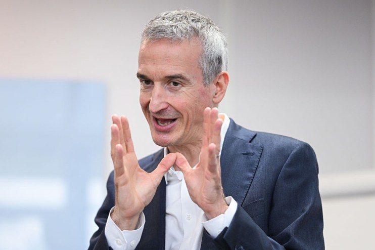 Eurotunnel CEO Yann Leriche discussing future expansion plans in a business meeting setting