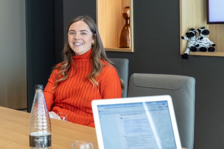 Annabel Hought discussing retail trends at RK Roundtable event, engaging with industry leaders, showcasing business insights