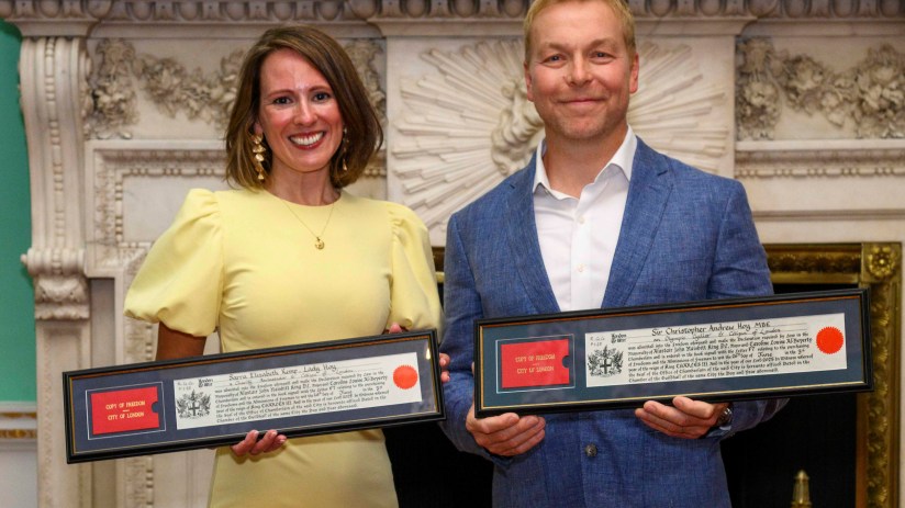 Chris Hoy delivering keynote speech at business conference, June 2025, addressing industry leaders and professionals.