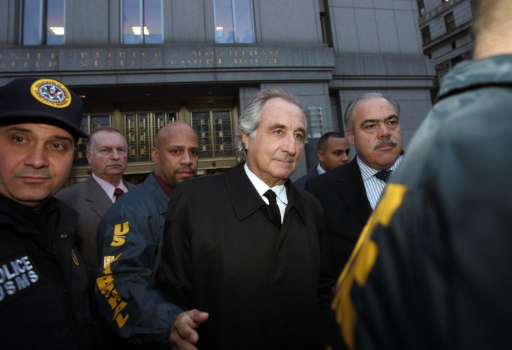 Bernie Madoff in a courtroom setting, wearing a suit, showcasing expressions related to financial fraud trial news.