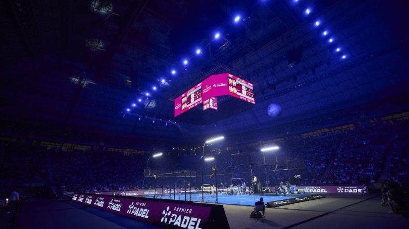 Premier Padel tournament action showcasing players in intense match, highlighting competitive sports environment.