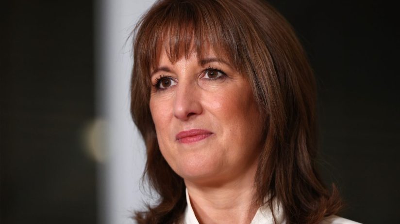 Rachel Reeves delivering a post-budget speech, confidently addressing economic strategies and fiscal policies in a formal ...