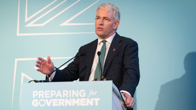 Danny Kruger of Reform UK discusses civil service reform at a press conference, emphasizing policy changes.