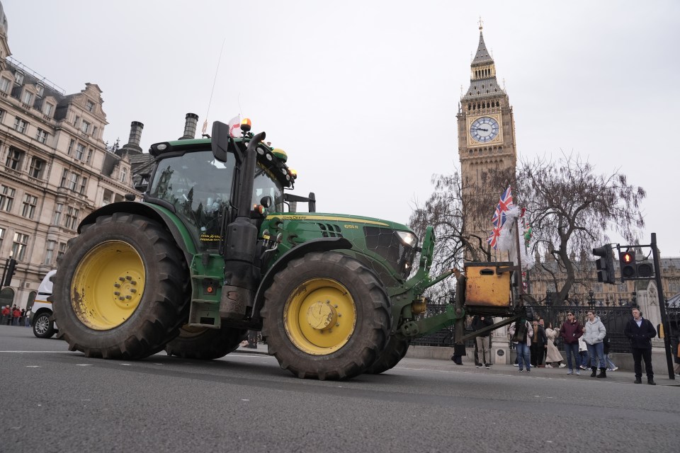 Tractor on farmland during tax protest, showcasing agricultural machinery and farmers advocating for policy change