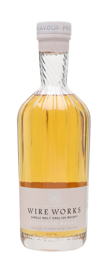 Wire Works Bourbon Barrel craftsmanship and intricate detailing in a distillery setting for premium whiskey production