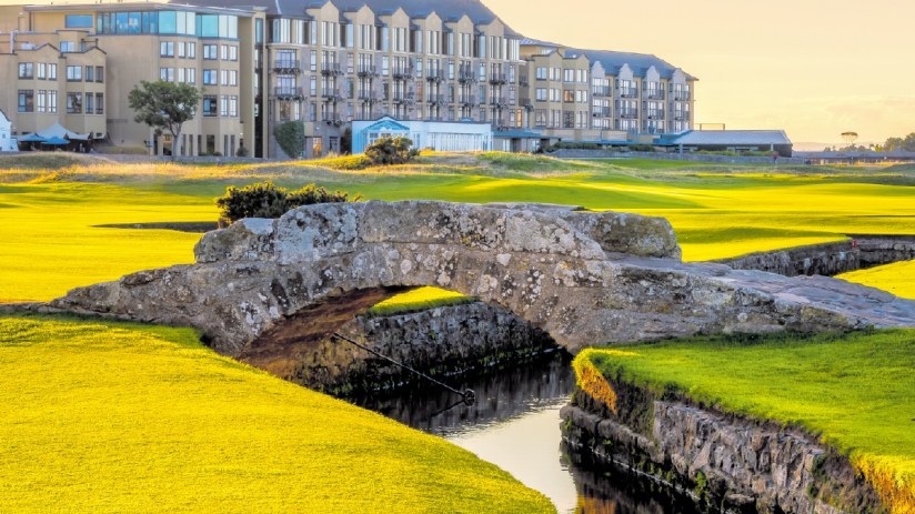 Old Course Hotel exterior showcasing historic architecture amidst lush green surroundings in a business news context
