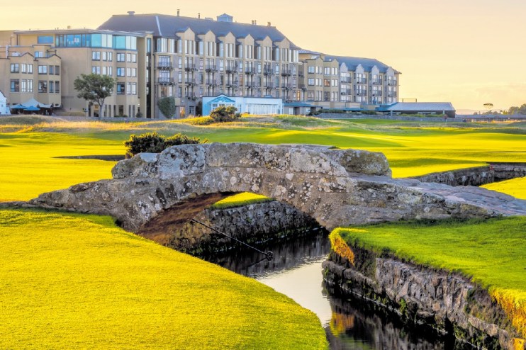 Old Course Hotel exterior showcasing historic architecture amidst lush green surroundings in a business news context
