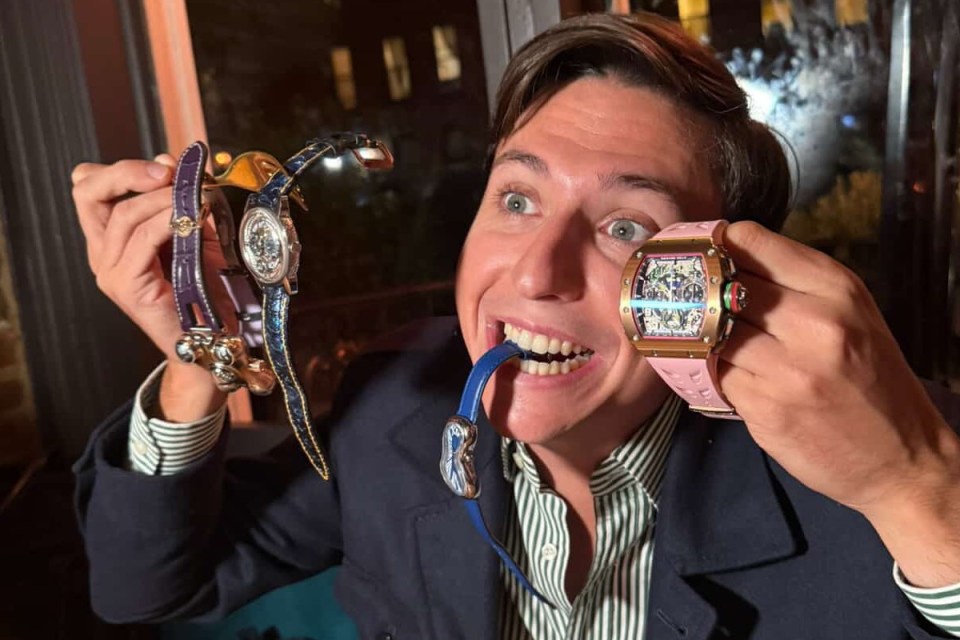 Andrea showcasing an exquisite watch collection, highlighting rare timepieces in a detailed display for collectors