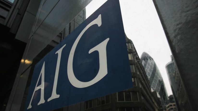 AIG corporate headquarters building with modern architecture and clear blue skies in a bustling business district