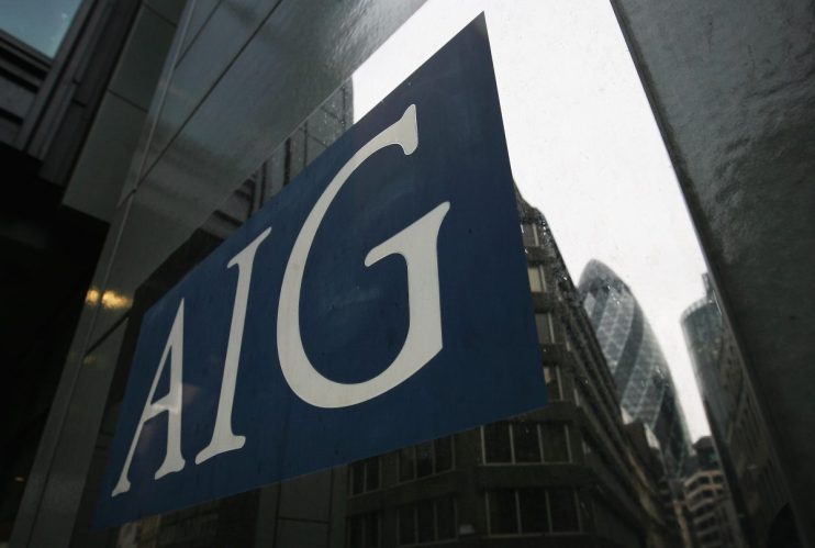 AIG corporate headquarters building with modern architecture and clear blue skies in a bustling business district